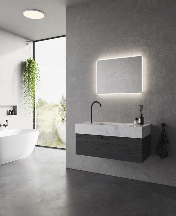 Nástenné svietidlo Nordlux Dovina Square je vďaka vysokému krytiu ideálne do kúpeľne. Toto kúpeľňové zrkadlo vytvára podsvietenie na stene. K dispozícii v priehľadnom variante.
